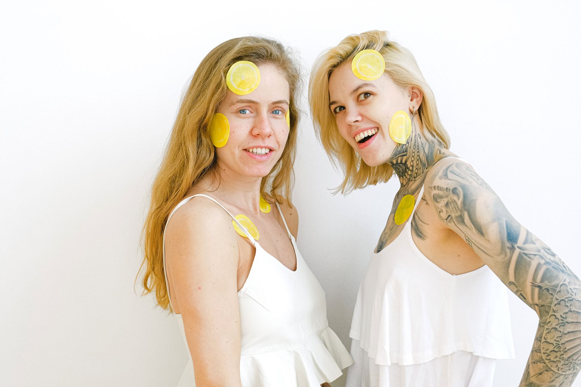Colorful clitoral suction toys displayed on a vibrant yellow background, showcasing modern pleasure design