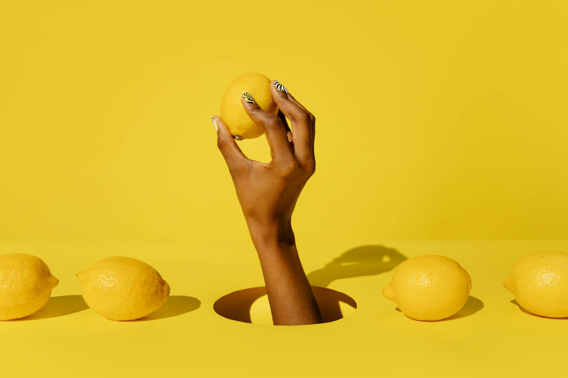 Two lemons on a white background representing quiet, discreet pleasure